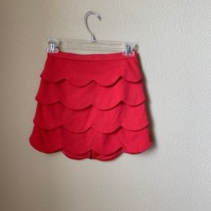red scalloped skirt